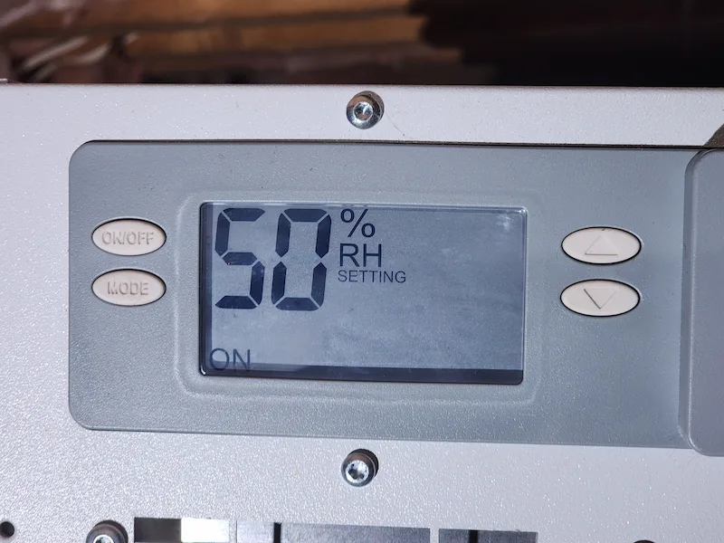 AprilAire dehumidifier display set to 50 percent relative humidity in Holly Springs NC home